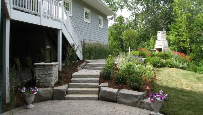 Backyard area with stone tile floor